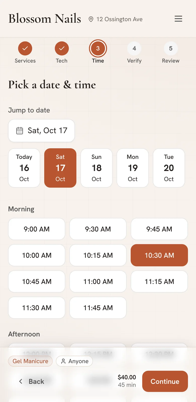A customer picking a time for a gel manicure on the salon's booking page, on their phone